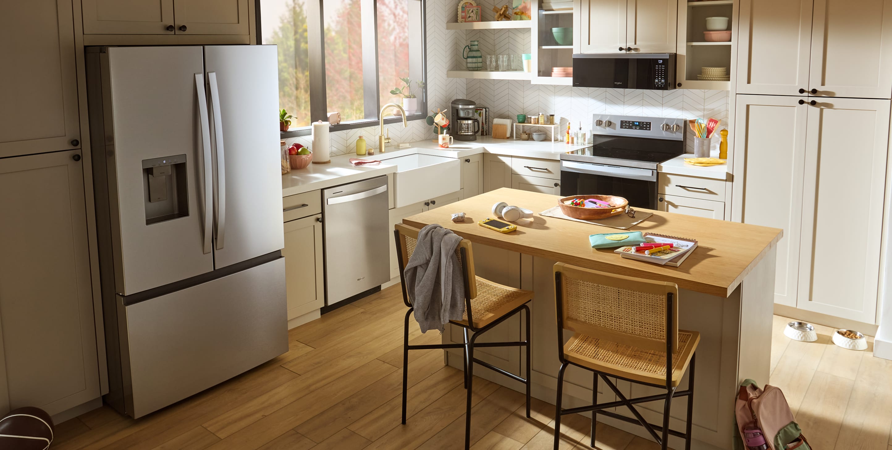 A bright, sunny kitchen with a full suite of Whirlpool® Appliances
