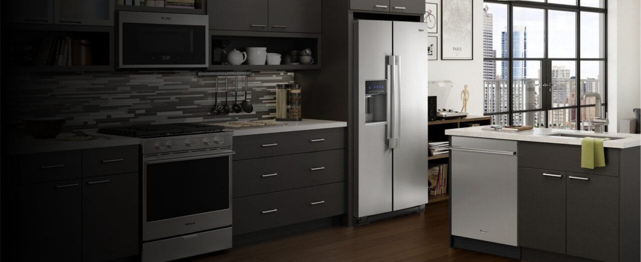 A full Whirlpool® kitchen suite with range, microwave refrigerator and dishwasher