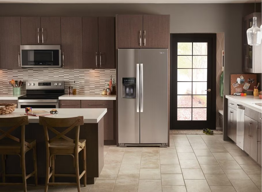 Whirlpool® refrigerator, range, microwave and dishwasher shown installed in a kitchen