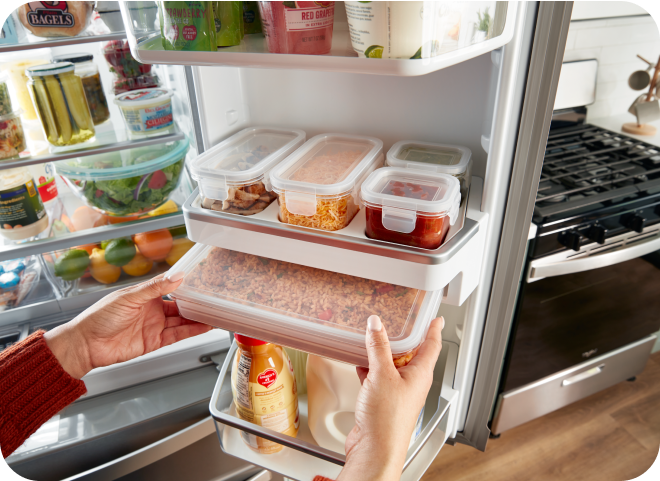 A Whirlpool® French Door Refrigerator with Prep & Store Bins