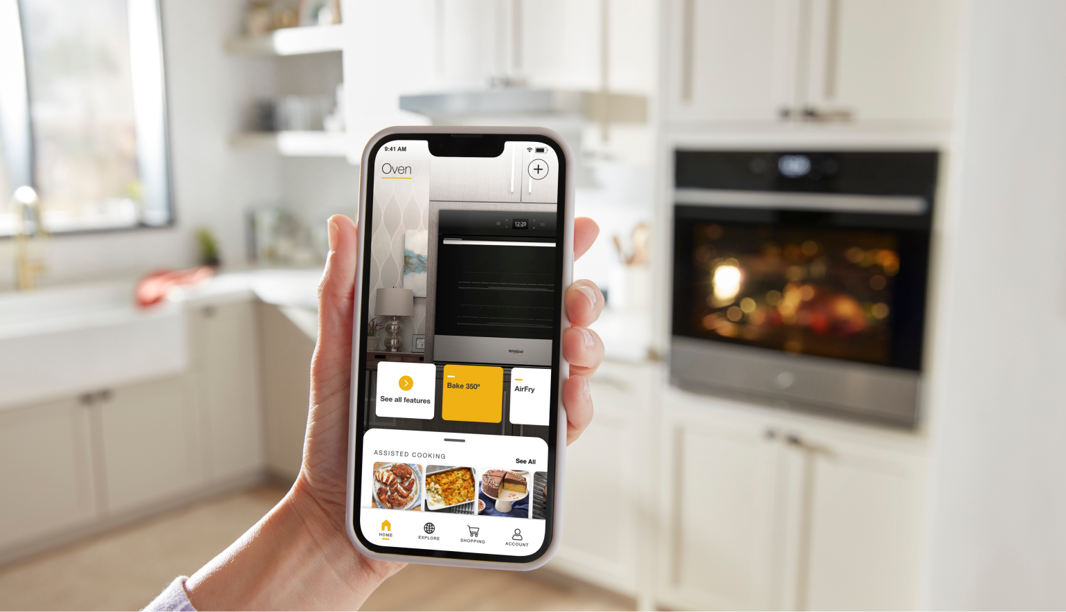 A person using the Whirlpool® App to set the temperature on a Whirlpool® Wall Oven