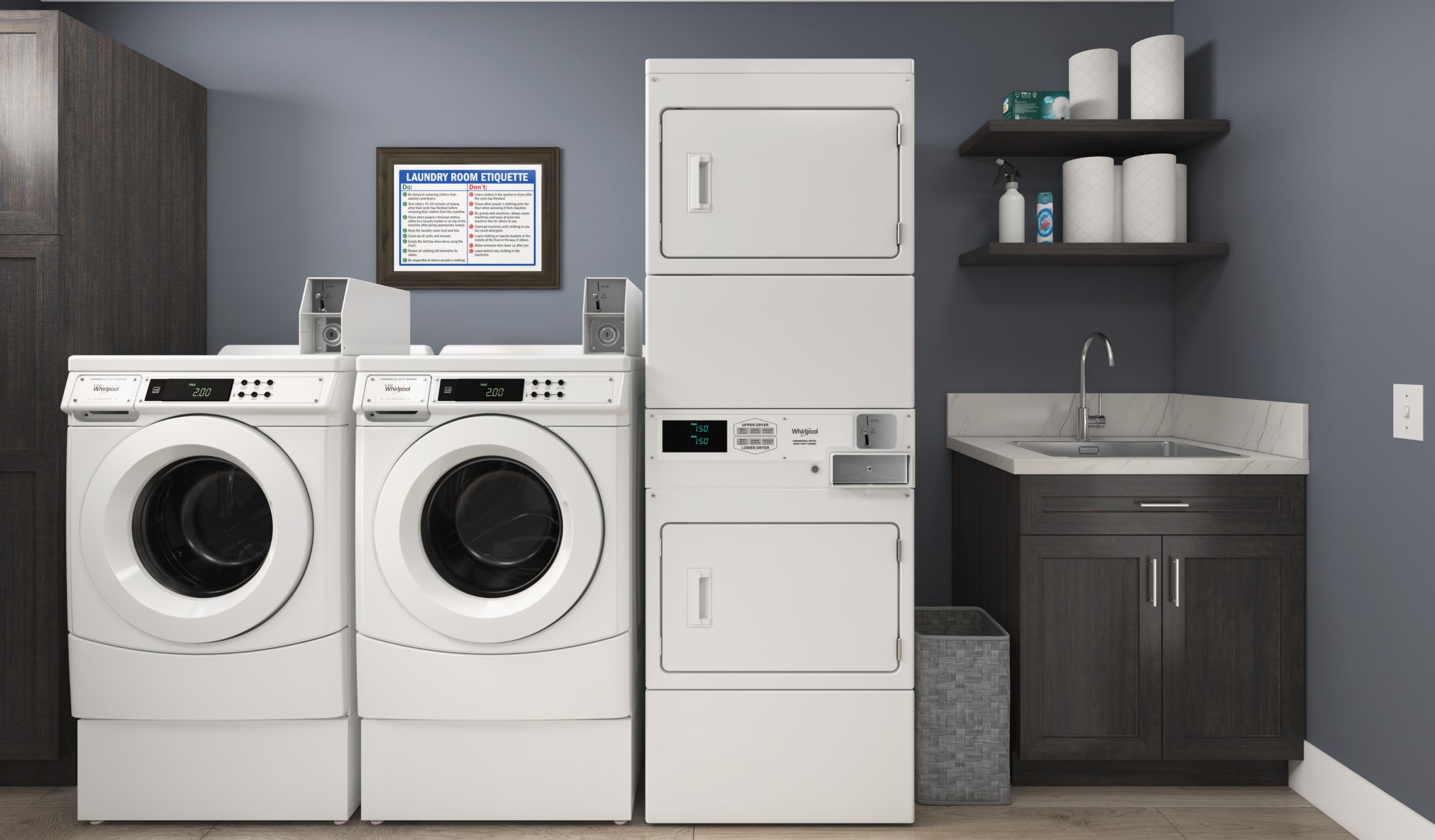 Two Whirlpool® Commercial Washers next to a stackable Whirlpool® Commercial Dryers