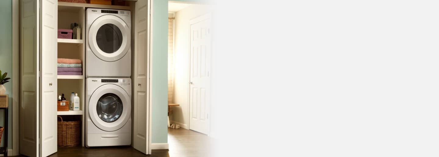 Whirlpool® Stackable Washer and Dryer inside a closet
