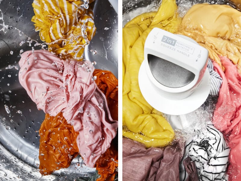 Split image of colorful clothing tumbling in a front load vs. a top load washer Split image of colorful clothing tumbling in a front load vs. a top load washer