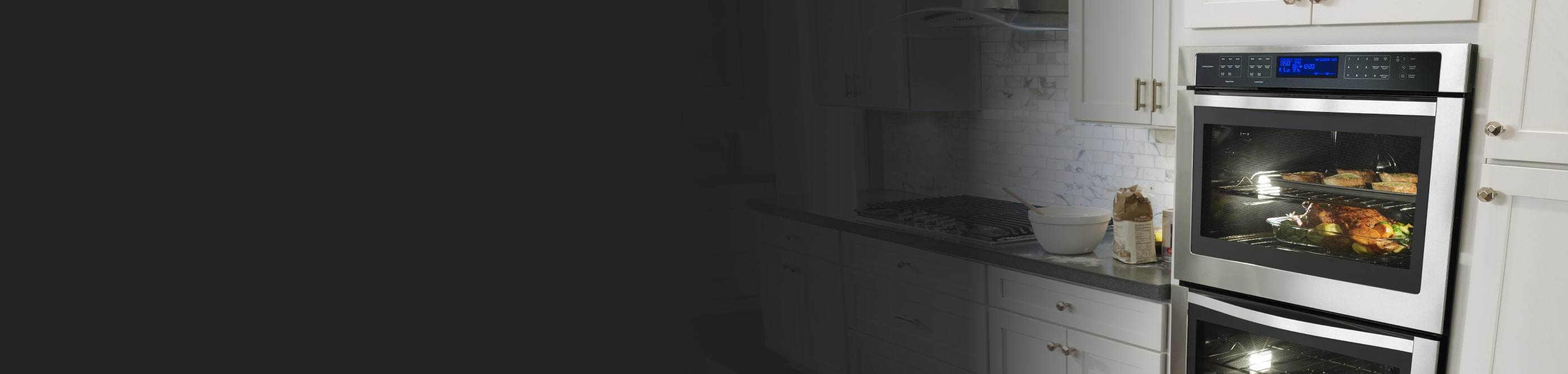 Whirlpool® double wall oven in a white modern kitchen