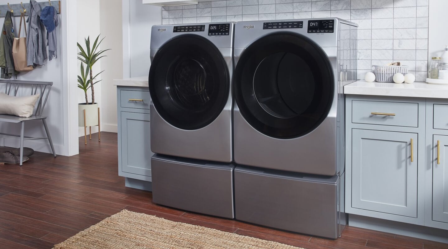 Gray Whirlpool®  Front Load Washer and Dryer placed side by side