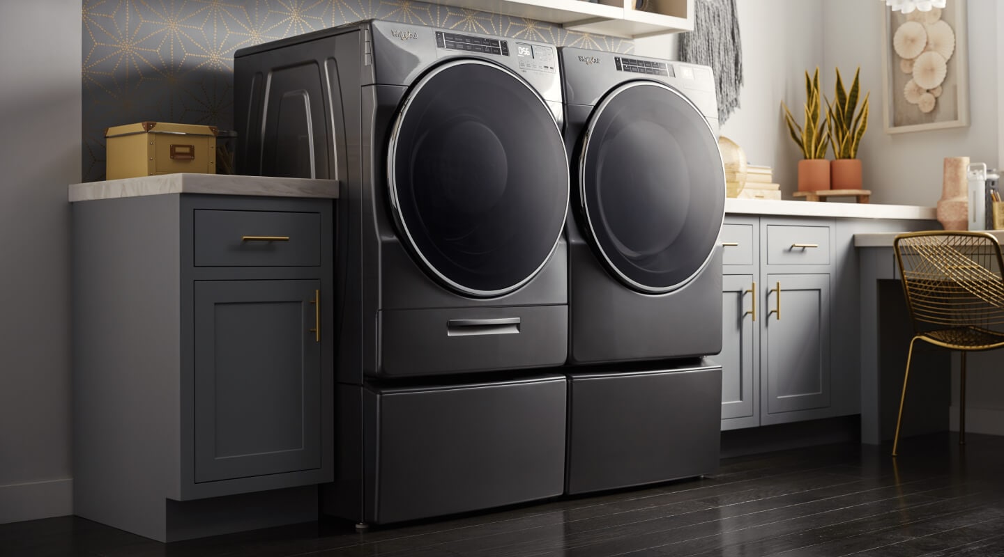 Black side-by-side washer and dryer from Whirlpool brand Black side-by-side washer and dryer from Whirlpool brand