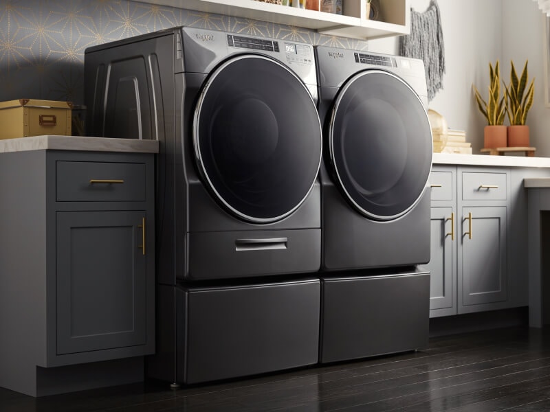 Black side-by-side washer and dryer from Whirlpool brand Black side-by-side washer and dryer from Whirlpool brand