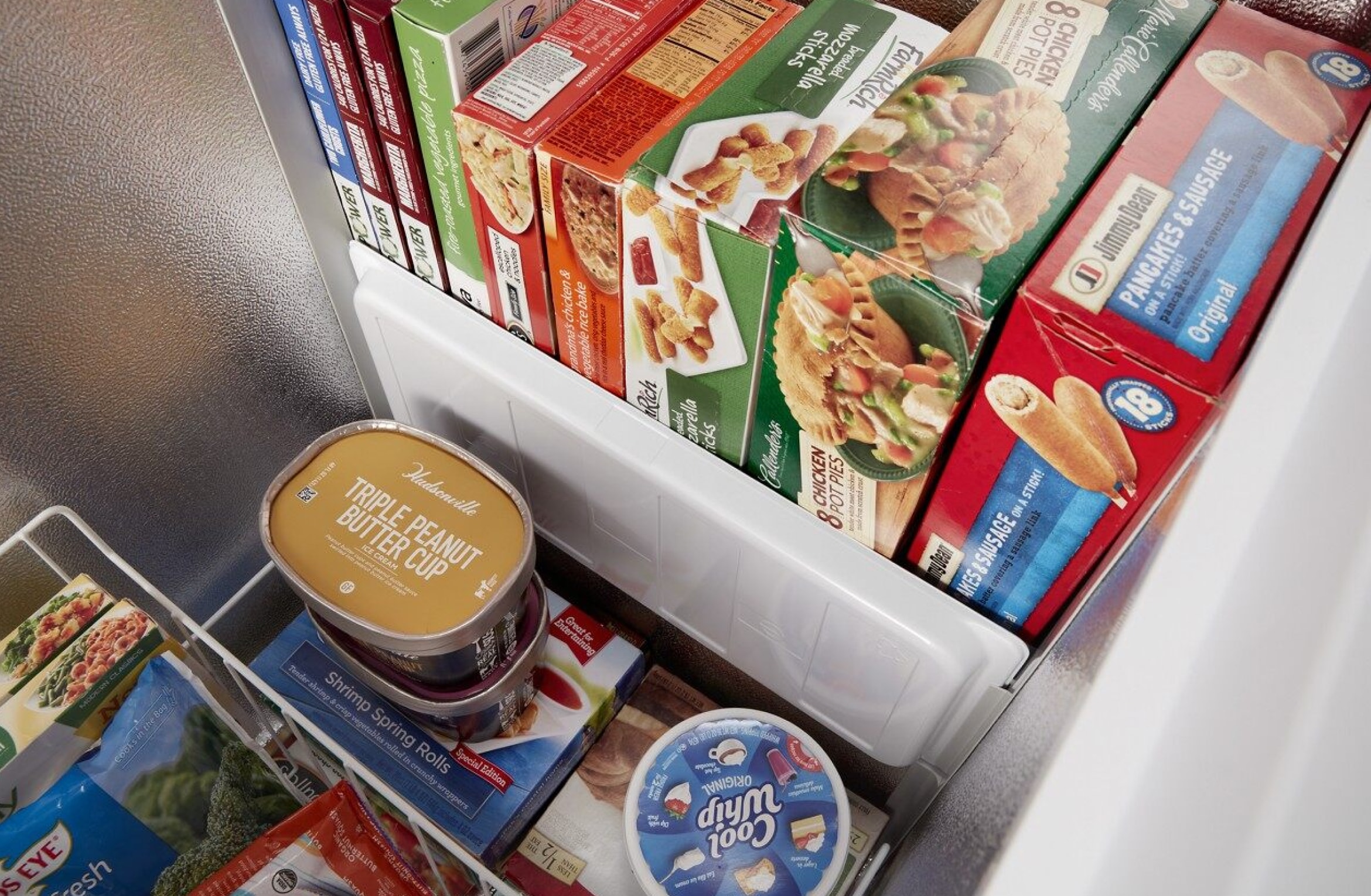 Close up view of food organized in a Whirlpool® deep freezer