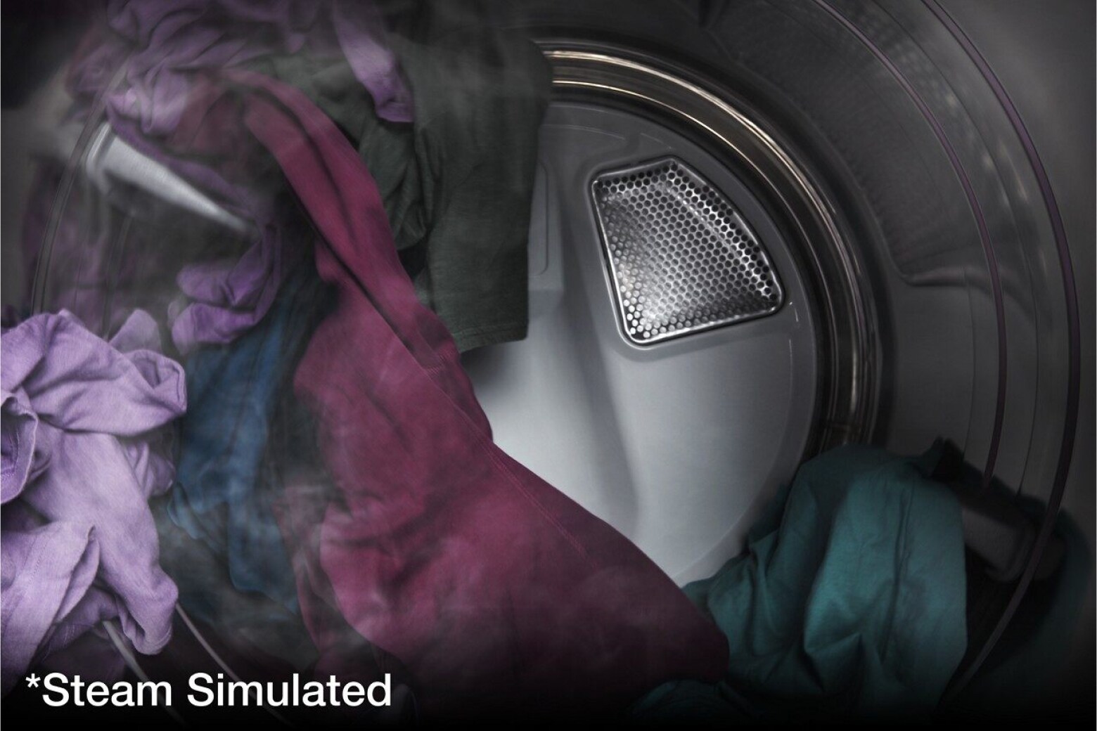 Clothes tumbling in a dryer with simulated steam Clothes tumbling in a dryer with simulated steam