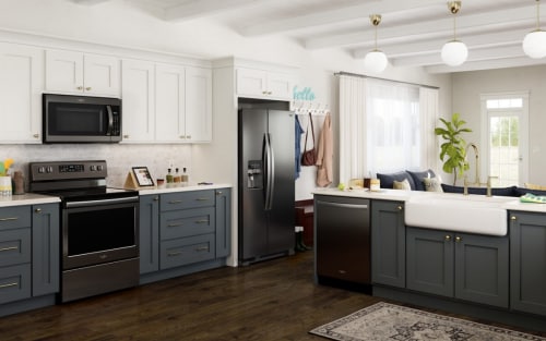 A kitchen with blue cabinets and stainless steel appliances