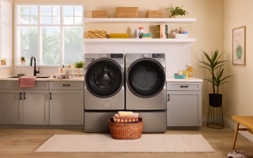 A Whirlpool® washer and dryer pair in a laundry room