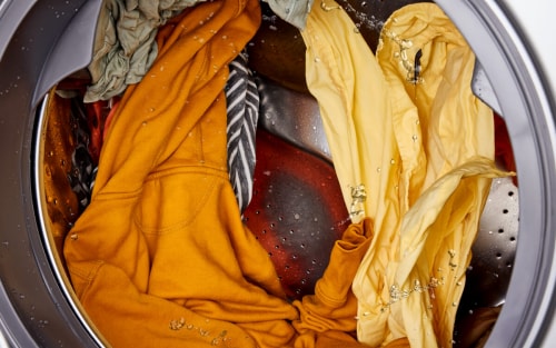 Clothes tumbling in a washer drum